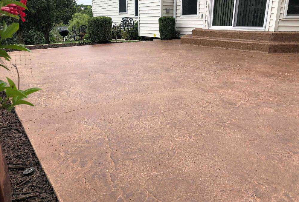 Earth toned colored concrete patio